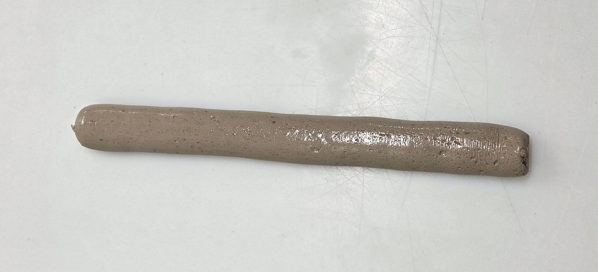 Norbait restructured bait sausage shown horizontally